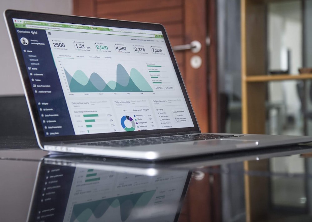 Executive team analyzing data to choose between Cloud and On-Premise ERP